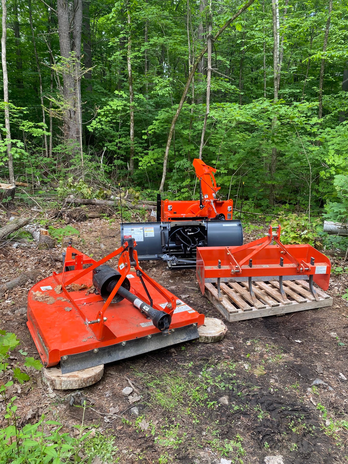 A look back at the land tools gathered in the woods, ready for clearing brush, smoothing ground, and handling snow when the season turns. So…