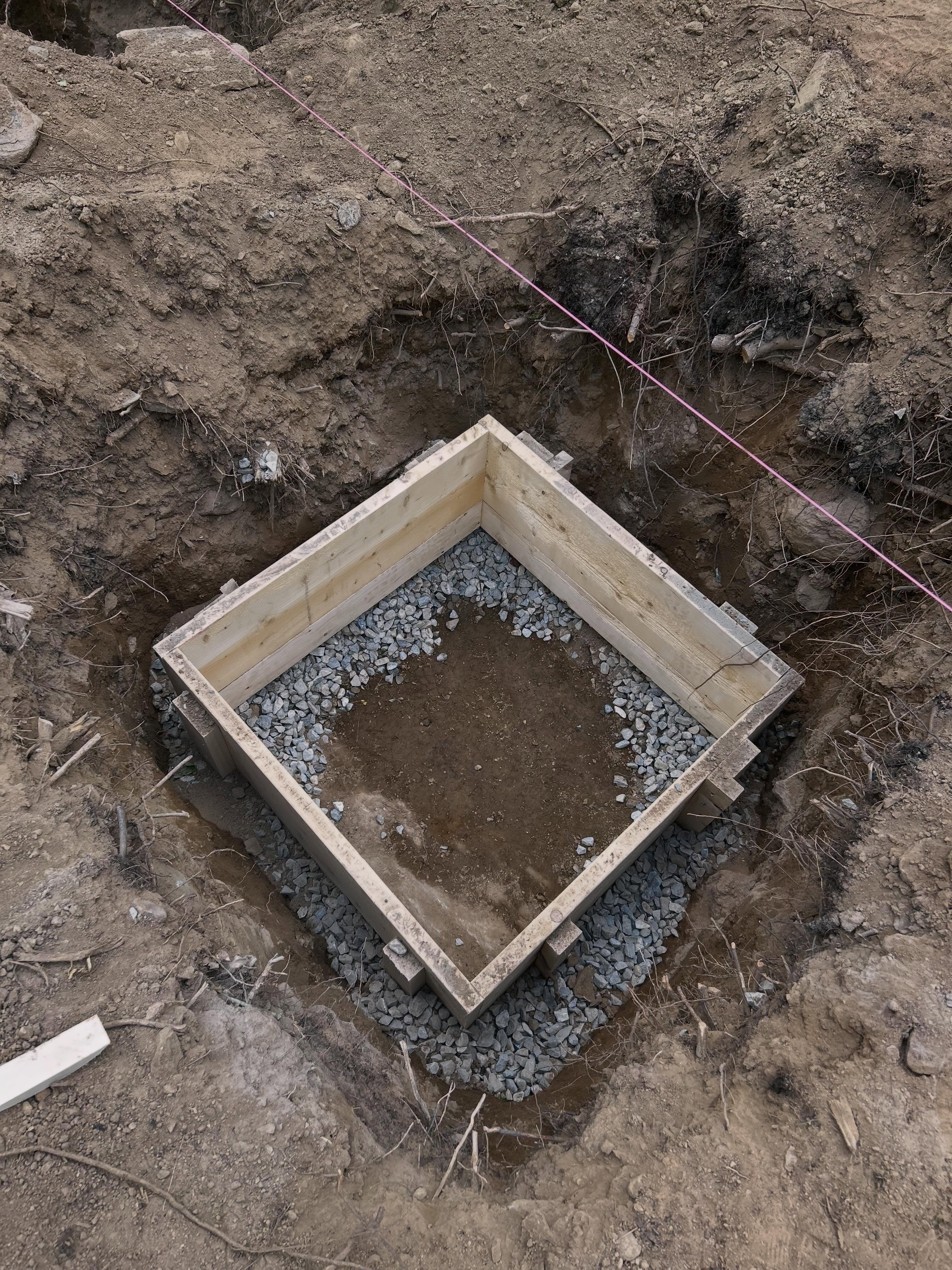Scribing the forms to the underlying bedrock, and stabilizing them so we can pour concrete in the coming weeks