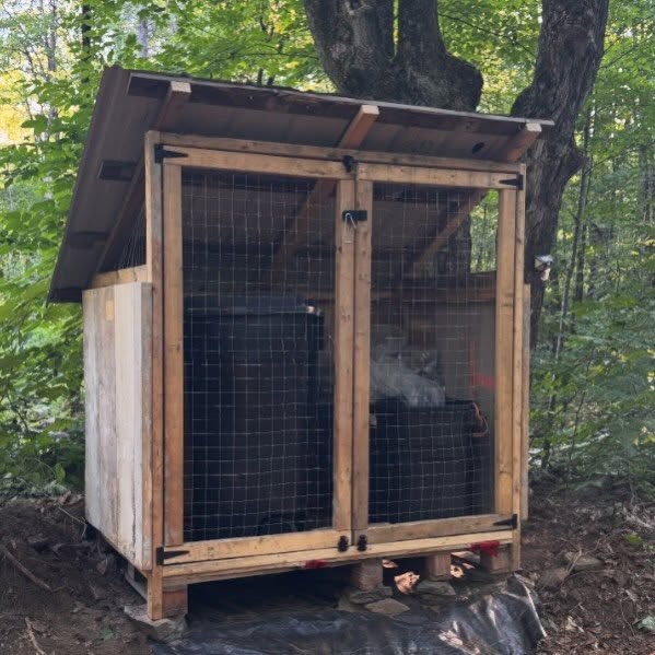 We finished building a garbage hut using recycled materials from our concrete forms and left over metal roofing We have had raccoon issues f…