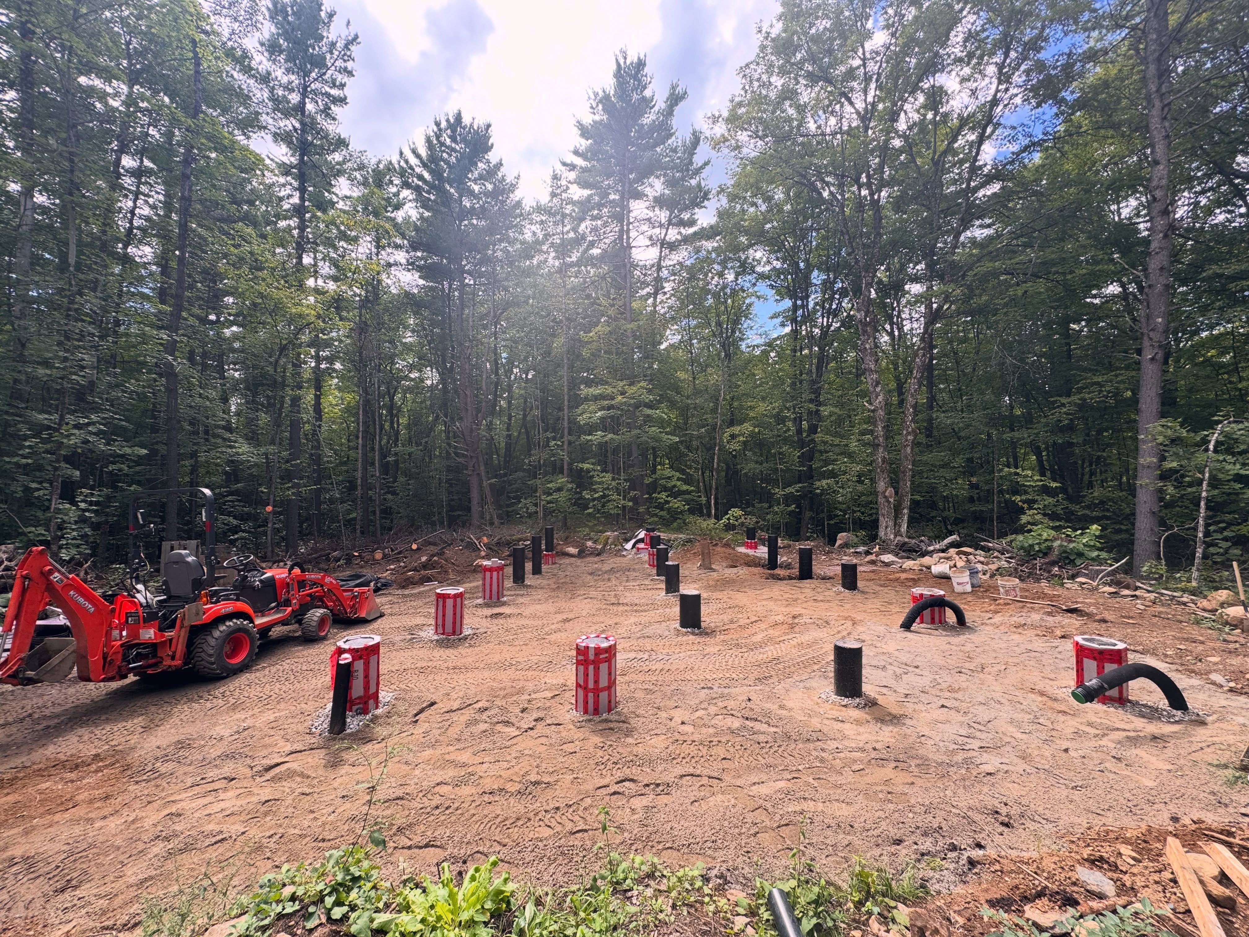Only a few more holes left to fill and some gravel to lay over the whole area for drainage. We should be onto building the floor this week