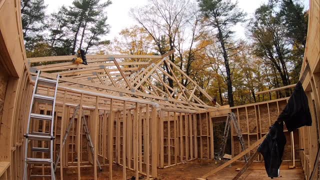 Each truss is placed with care, secured in spot, and will be laterally braced soon